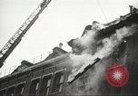 Image of building on fire London England United Kingdom, 1939, second 24 stock footage video 65675064530