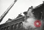Image of building on fire London England United Kingdom, 1939, second 25 stock footage video 65675064530