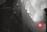 Image of building on fire London England United Kingdom, 1939, second 31 stock footage video 65675064530