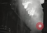 Image of building on fire London England United Kingdom, 1939, second 32 stock footage video 65675064530