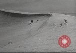 Image of skiing equipment United States USA, 1942, second 57 stock footage video 65675064553