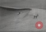 Image of skiing equipment United States USA, 1942, second 60 stock footage video 65675064553