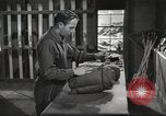 Image of skiing equipment United States USA, 1942, second 8 stock footage video 65675064554
