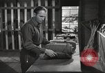 Image of skiing equipment United States USA, 1942, second 9 stock footage video 65675064554
