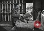 Image of skiing equipment United States USA, 1942, second 23 stock footage video 65675064554