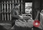 Image of skiing equipment United States USA, 1942, second 25 stock footage video 65675064554