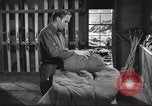 Image of skiing equipment United States USA, 1942, second 28 stock footage video 65675064554
