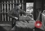 Image of skiing equipment United States USA, 1942, second 30 stock footage video 65675064554