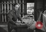 Image of skiing equipment United States USA, 1942, second 34 stock footage video 65675064554