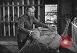Image of skiing equipment United States USA, 1942, second 37 stock footage video 65675064554