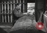 Image of skiing equipment United States USA, 1942, second 42 stock footage video 65675064554