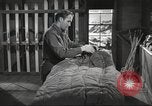 Image of skiing equipment United States USA, 1942, second 43 stock footage video 65675064554