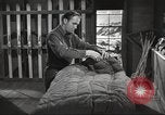Image of skiing equipment United States USA, 1942, second 44 stock footage video 65675064554