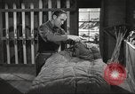 Image of skiing equipment United States USA, 1942, second 46 stock footage video 65675064554