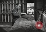 Image of skiing equipment United States USA, 1942, second 48 stock footage video 65675064554