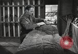 Image of skiing equipment United States USA, 1942, second 49 stock footage video 65675064554