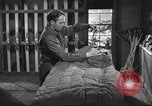 Image of skiing equipment United States USA, 1942, second 50 stock footage video 65675064554