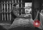Image of skiing equipment United States USA, 1942, second 51 stock footage video 65675064554
