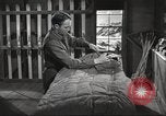 Image of skiing equipment United States USA, 1942, second 52 stock footage video 65675064554