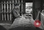 Image of skiing equipment United States USA, 1942, second 53 stock footage video 65675064554
