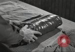Image of skiing equipment United States USA, 1942, second 55 stock footage video 65675064554