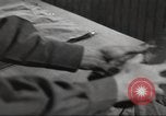 Image of skiing equipment United States USA, 1942, second 56 stock footage video 65675064554
