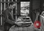 Image of skiing equipment United States USA, 1942, second 57 stock footage video 65675064554
