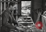 Image of skiing equipment United States USA, 1942, second 60 stock footage video 65675064554