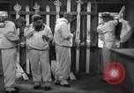 Image of skiing equipment United States USA, 1942, second 30 stock footage video 65675064558