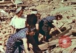 Image of German women clear rubble Germany, 1945, second 43 stock footage video 65675064582