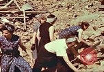 Image of German women clear rubble Germany, 1945, second 52 stock footage video 65675064582
