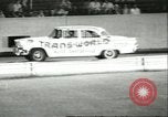 Standbild Auto und Motorrad Stunt Show Chicago Illinois USA, 1956, aus Sekunde 55 historischem Filmmaterial Videoclip 65675064641