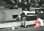 Standbild Auto und Motorrad Stunt Show Chicago Illinois USA, 1956, aus Sekunde 57 historischem Filmmaterial Videoclip 65675064641