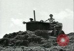 Standbild japanische Arbeiter Japan, 1957, aus Sekunde 59 historischem Filmmaterial Videoclip 65675064703