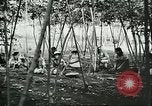 Image of Brazilian rubber tree farmers for Ford Brazil, 1942, second 4 stock footage video 65675064715
