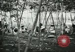 Image of Brazilian rubber tree farmers for Ford Brazil, 1942, second 6 stock footage video 65675064715