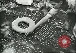 Image of Brazilian rubber tree farmers for Ford Brazil, 1942, second 13 stock footage video 65675064715