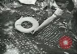 Image of Brazilian rubber tree farmers for Ford Brazil, 1942, second 16 stock footage video 65675064715