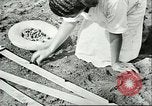 Image of Brazilian rubber tree farmers for Ford Brazil, 1942, second 46 stock footage video 65675064715