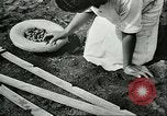 Image of Brazilian rubber tree farmers for Ford Brazil, 1942, second 47 stock footage video 65675064715