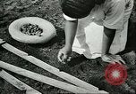 Image of Brazilian rubber tree farmers for Ford Brazil, 1942, second 48 stock footage video 65675064715