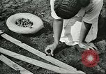 Image of Brazilian rubber tree farmers for Ford Brazil, 1942, second 49 stock footage video 65675064715