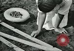 Image of Brazilian rubber tree farmers for Ford Brazil, 1942, second 50 stock footage video 65675064715