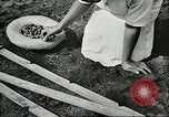 Image of Brazilian rubber tree farmers for Ford Brazil, 1942, second 51 stock footage video 65675064715