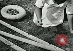 Image of Brazilian rubber tree farmers for Ford Brazil, 1942, second 52 stock footage video 65675064715