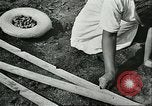 Image of Brazilian rubber tree farmers for Ford Brazil, 1942, second 53 stock footage video 65675064715