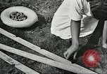 Image of Brazilian rubber tree farmers for Ford Brazil, 1942, second 54 stock footage video 65675064715