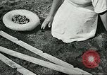 Image of Brazilian rubber tree farmers for Ford Brazil, 1942, second 56 stock footage video 65675064715