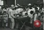 Image of Brazilian natives at market Brazil, 1932, second 37 stock footage video 65675064724
