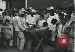 Image of Brazilian natives at market Brazil, 1932, second 38 stock footage video 65675064724